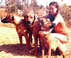 Norah with three dogs
