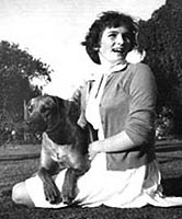 Laurie with dog in her lap